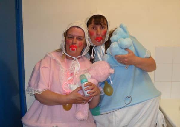 Christine Vickers (left) and Sharon Mercer dressed up as babies and hired a limousine