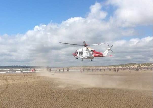 The coastguard helicopter at Camber Sands. Photo by Emma B