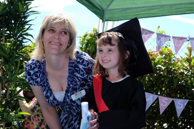 Children graduate from Cooperative Childcare nursery at  St Richards Hospital in Chichester