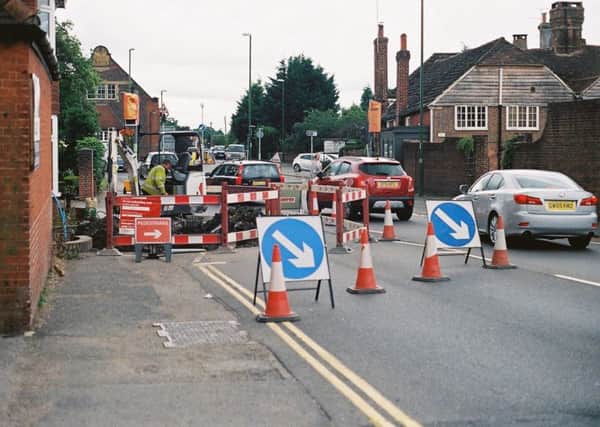 Graham Hazard took these pictures of the roadworks and traffic queues imn Cowfold on Sunday July 24, and Monday July 25.