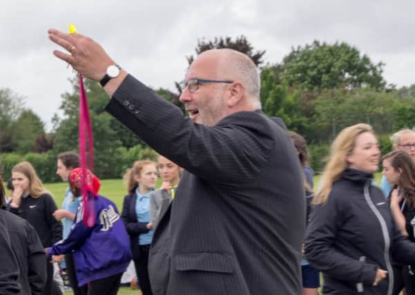 Chris Burton with the whistle at this year's sports day
