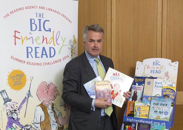 Tim Loughton, MP for East Worthing and Shoreham, backs children's summer reading challenge (photo submitted). SUS-160726-140911001