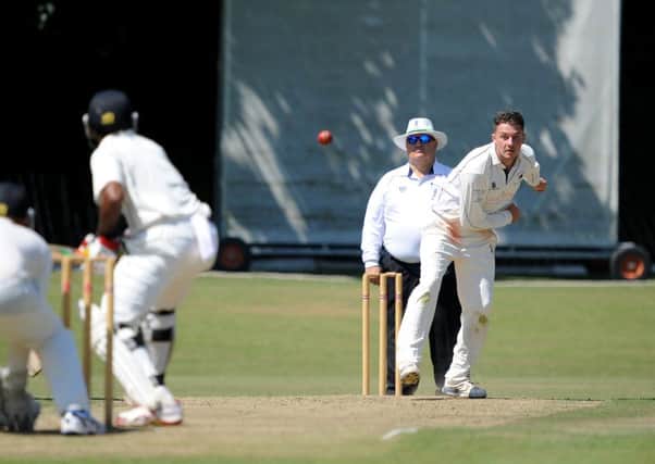Cricket : Sussex League Premier Division: Roffey (fielding) v Billingshurst. George Flemmig (bowling) . Pic Steve Robards   SR1622491 SUS-160725-175449001