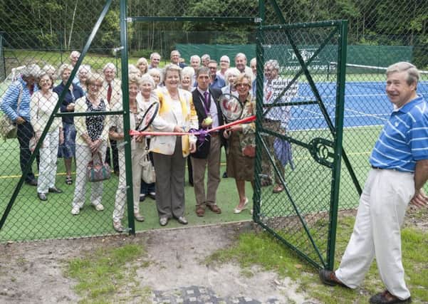 The ribbon cutting for the official opening of the tennis courts by Chair of Supporters at Lodge Hill Hilary Tupper, the Mayor of Bognor Regis Pat Dillon, and trustees and friends of Lodge Hill. Picture by Graham Franks Photogrpahy SUS-160727-094143001