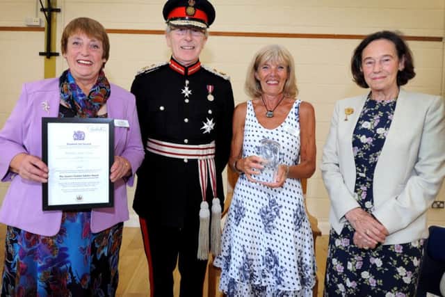 Pett Older People's Project receive Queens Award for Voluntary Service.

L-R Sheila Thomas (Co-ordinator), Peter Field ( Lord Lieutenant for East Sussex), Ann Nicholls (Chairman), Angela Sellick (Deputy Lieutenant). SUS-160726-125014001