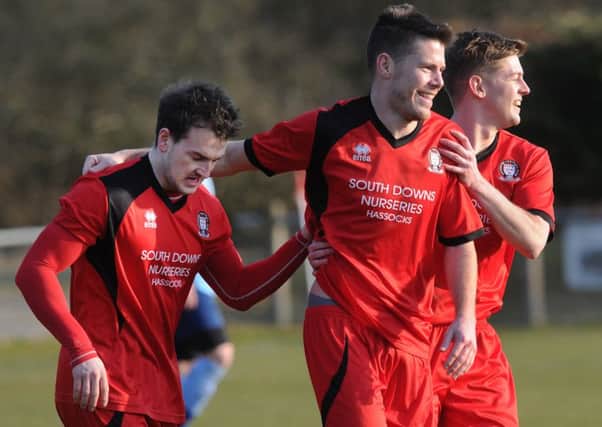 Hassocks FC V Ringmer 14/3/15 Jamie Hillwood scores for Hassocks (Pic by James Rigby) SUS-150316-104346008