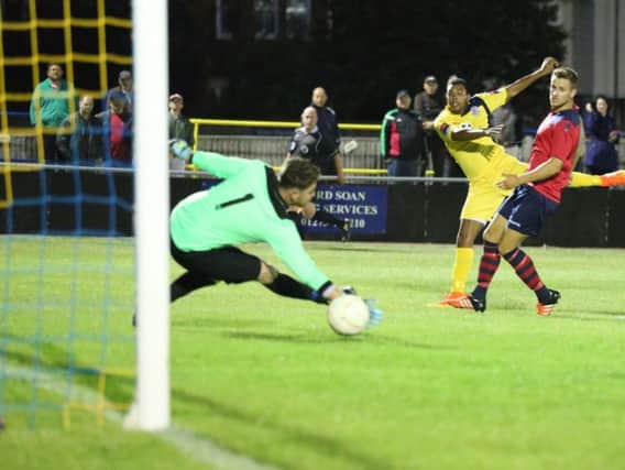 Jack Harris scores his second goal for Hastings United against Eastbourne Town last night.