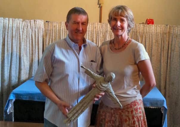 Matthew and Sally Bristow with the new crucifix