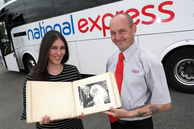 Rosalyn Golds, head of media at National Express, and Shaun Stead, coach driver, pictured with the lost wedding album. 
Picture by Adam Fradgley. SUS-160727-131357001