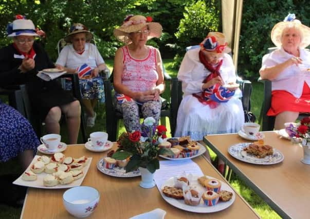 Royal-themed garden party held by Brighton Road Baptist Church as part of their three-day Holiday At Home event SUS-160819-161350001