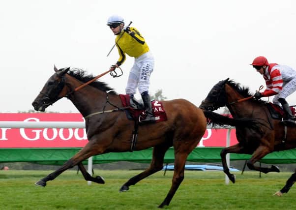 Jamie Spencer wins the Goodwood Cup on Big Orange / Picture by Kate Shemilt