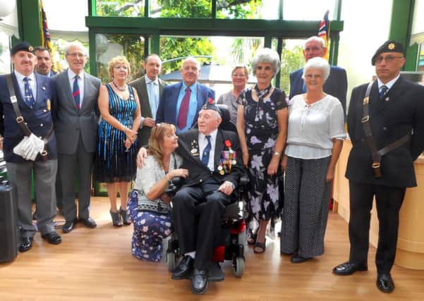 Leonard Simmonds presented with medal at Mais House, Bexhill. Photo by Margaret Garcia