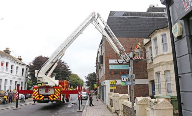 Firefighters at the scene on Rowlands Road, Worthing. Photo by Eddie Mitchell. SUS-160730-161627001