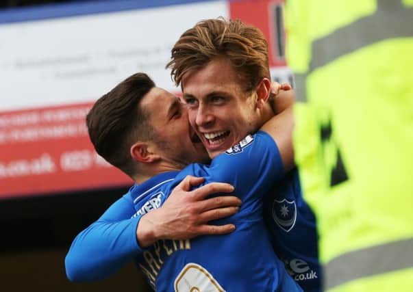 Conor Chaplin, left, and former Pompey team-mate Adam Webster  Picture: Joe Pepler