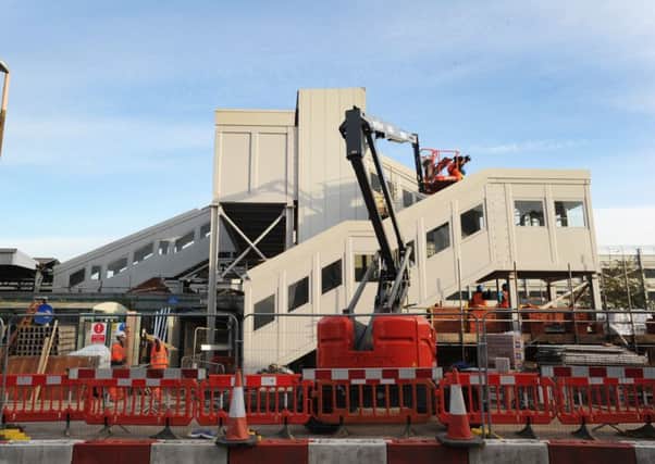 Work began on the footbridge at Haywards Heath station in November 2015. (Pic by Jon Rigby) SUS-151124-092702008