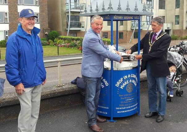 The wishing well is unveiled. Pic: Laura Cartledge