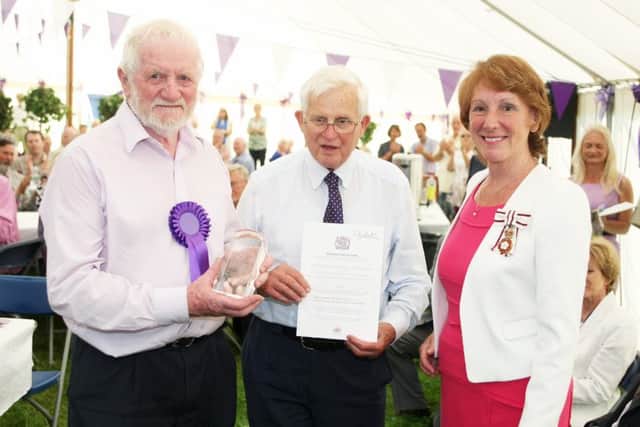 DM16129932a.jpg Weald and Downland Open Air Museum volunteers win the Queen's Award for Voluntary Service. Vic Constable, left and John Walshe accept the award from The Lord-Lieutenant of West Sussex Mrs Susan Pyper. Photo by Derek Martin SUS-160721-095146008