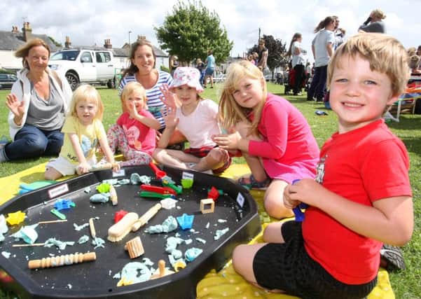 Modelling with play dough at the National Play Day event at Florence Park Chichester. Pictures: Derek Martin DM16132522a