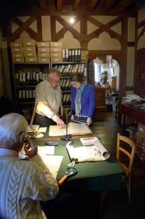 Volunteers and staff during research at the archive of Arundel Castle, in February 2016