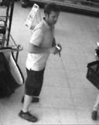 Police say they would like to speak with this man, pictured in Peacehaven Sainsbury's,  in connection with a 'public order matter' SUS-160408-134747001