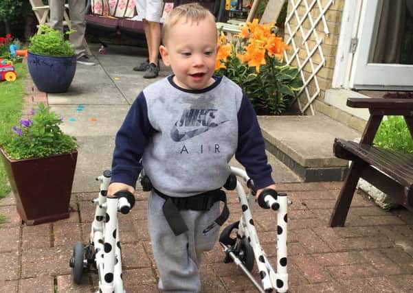 Sonny Hamilton from Broadfield, Crawley whose mum Katie Finkle has launched a campaign to raise Â£80,000 for an operation to enable him to walk - picture submitted by family