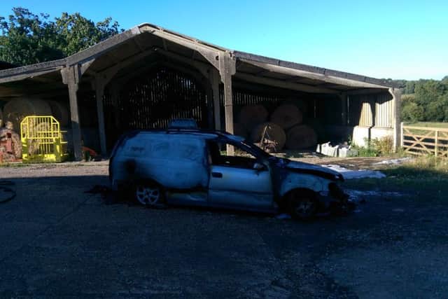 The aftermath of a van fire at an Etchingham farmyard. Picture courtesy of Burwash Fire Station. SUS-160708-152050001