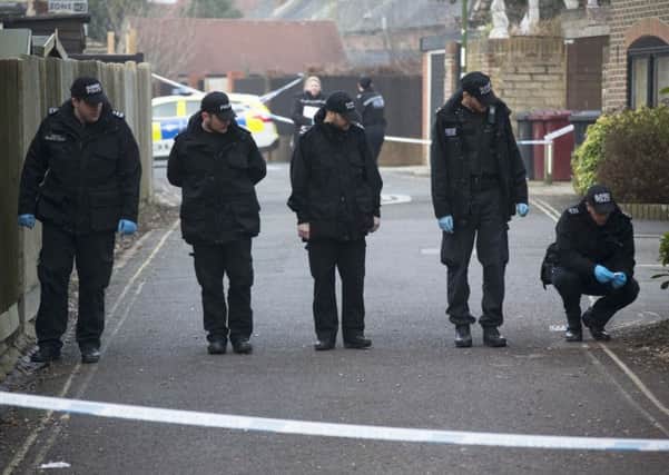 Police search following the murder in March. Photo: Eddit Mitchell