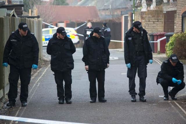 Police searching the area where Luke Jeffrey was found. Picture by Eddie Mitchell