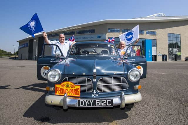 Claudine Bloom and co-driver Andy Twort with Amy, the 1975 Volvo Amazon car SUS-160908-152329001
