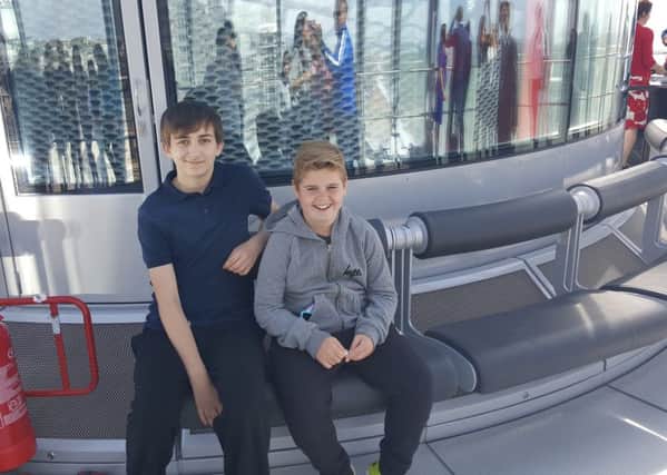 Danny Woolven 15 (left), Cameron Sinclair 12 (right) on the British Airways i360 SUS-160908-102919001