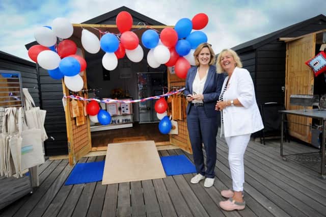 Amber Rudd opens The Peer Collection kiosk on Hastings Pier.

Amber is pictured with kiosk owner Sue Jones. SUS-160731-114602001