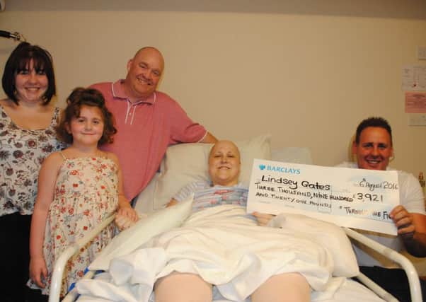 Lindsey Gates with her husband Jason and children Brooke
and Charley, and right, Hane Yerrell from the charith Through the Fight

He donated Â£3,921 to her to help pay for her funeral

Submitted August 2016 PPP-160908-180800001