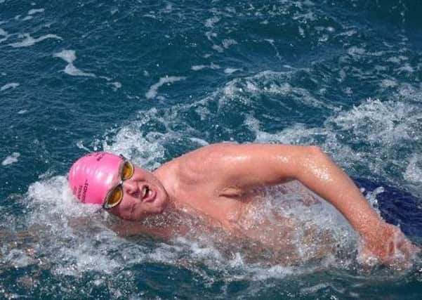 Mike Latham from East Preston swam the Channel for the WADARS charity SUS-160308-092502001