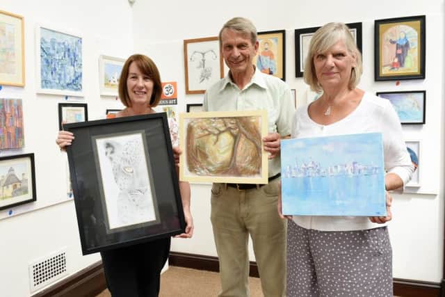 Amanda Callagham, Chris Weymouth and Cilla Isted with their work