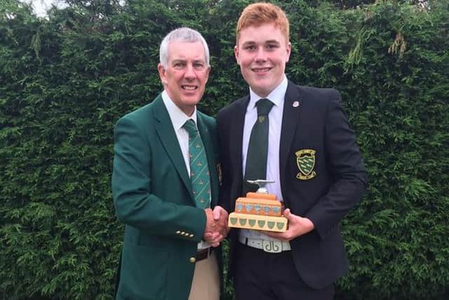Ifield Golf Club captain Steve Tigg with competition winner Billy Groom SUS-160408-164640002