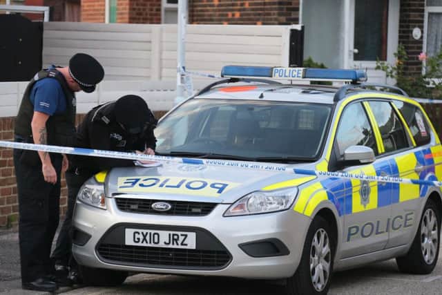 Police are still at the scene following the murder of a Worthing man. Photo: Eddie Mitchell
