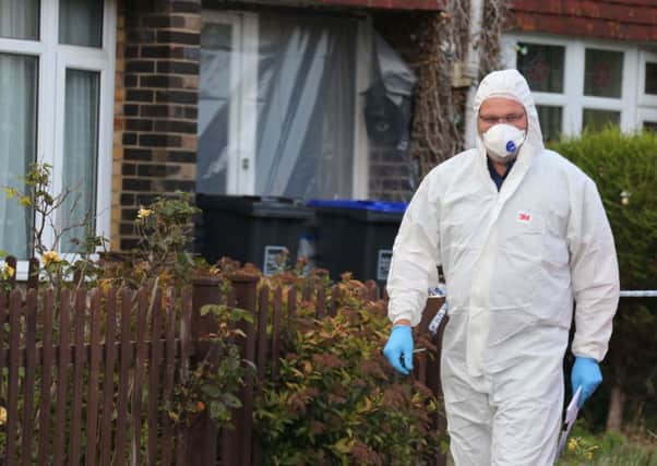 Police are still at the scene following the murder of a Worthing man. Photo: Eddie Mitchell