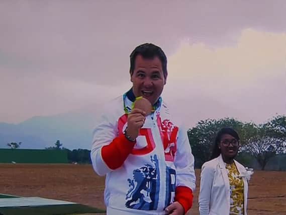 Steve Scott is all smiles after receiving his bronze medal on the podium in Rio