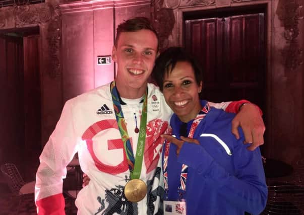 Gold medal-winning kayaker Joe Clarke with his inspiration Dame Kelly Holmes at last nights celebration Pic: JP