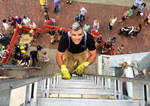Chief fire officer Lee Neale joins the climb. Photo submitted by West Sussex Fire & Rescue Service