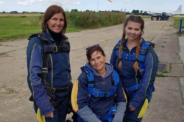 Amanda with her daughter Meg (right) and friend Kerry, who did the skydive with her