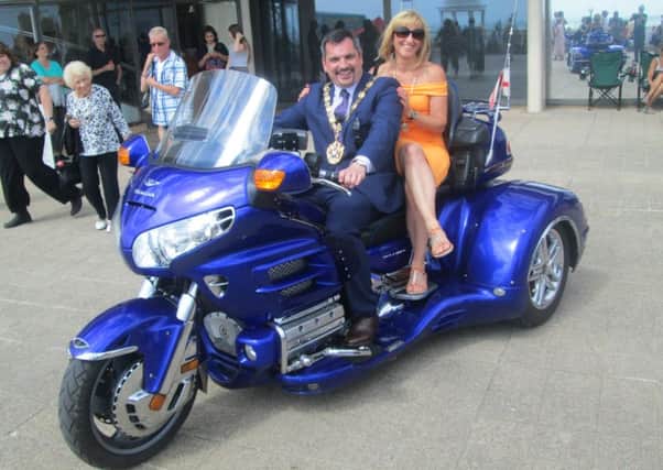 Bexhill mayor Simon Elford had a go on a Honda Goldwing trike with his wife Tanya. Photo by Howard Martin SUS-160817-154626001