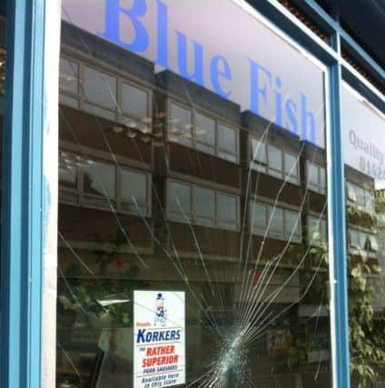 Blue Fish's smashed window will cost Â£500 to be repaired SUS-161208-132259001