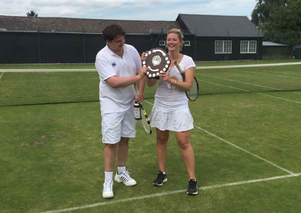 Alice Jeffries and Archie Godman-Dorington with their trophy