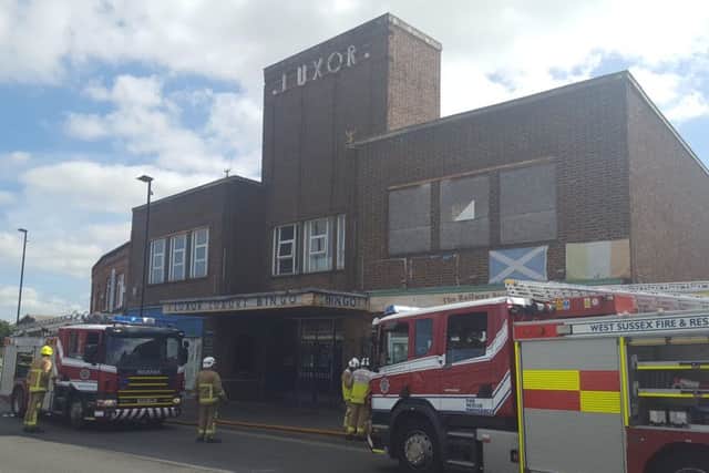 The fire service have put out the blaze at the old Luxor cinema building in South Street, Lancing. Picture: Neil Godfrey