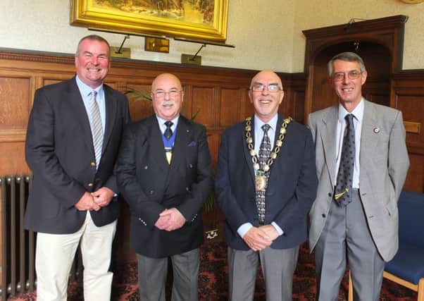 From left: Peter Chisholm MBE, Cllr Bruce Forbes MSDC Vice Chairman, Cllr Peter Reed MSDC Chairman, and Melvin Phillips BEM