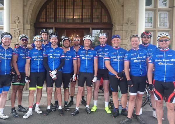 Andy Sparsis and his team of 13 cyclists SUS-160819-113353001