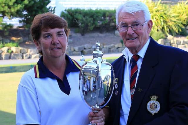 Hastings Open Bowls Tournament ladies' singles winner Maxine Clarkson with tournament president Gordon Leggatt. Picture courtesy Bob Bogie