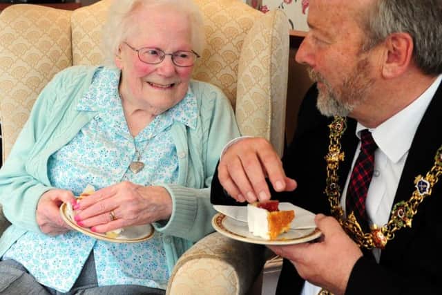 Amy Chalcraft celebrating her 90th birthday with Worthing mayor Sean McDonald. Picture: Kate Shemilt ks16000816-1