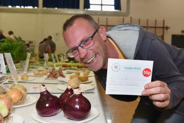 Gary Thompson Best Newcomer in Show with his prize winning onions